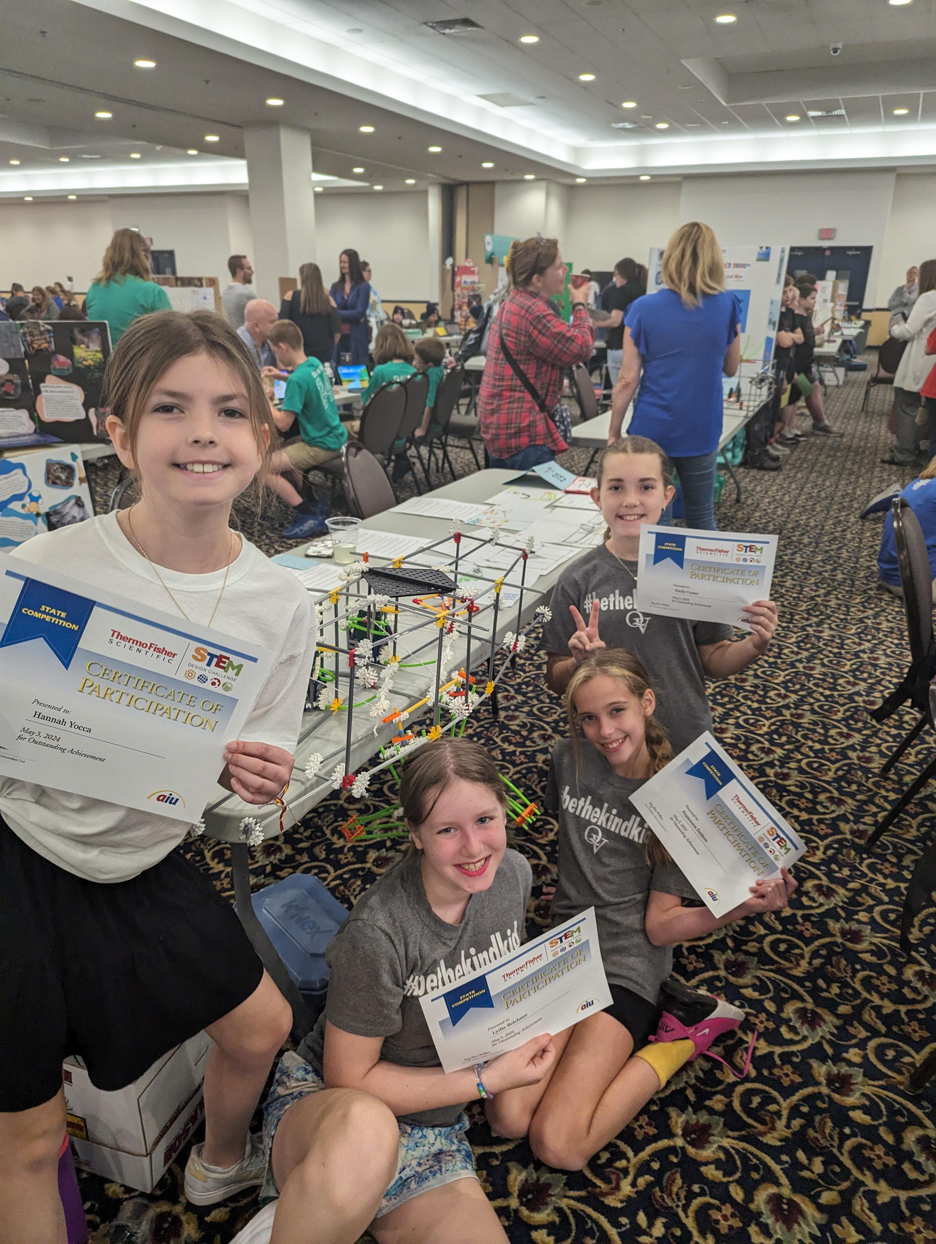 Image depicts members of the Edgeworth STEM Design Challenge Team posing with their certificates of participation.